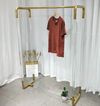 High end giyim mağazası vitrin rafı kadın giyim mağazası paslanmaz çelik altın şeffaf akrilik iniş orta ada ra 2
